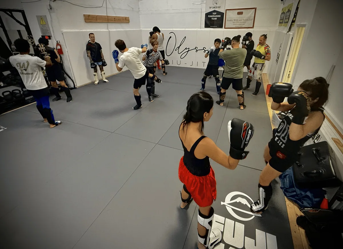 AOMT students practicing Muay Thai drills in the Atlanta gym